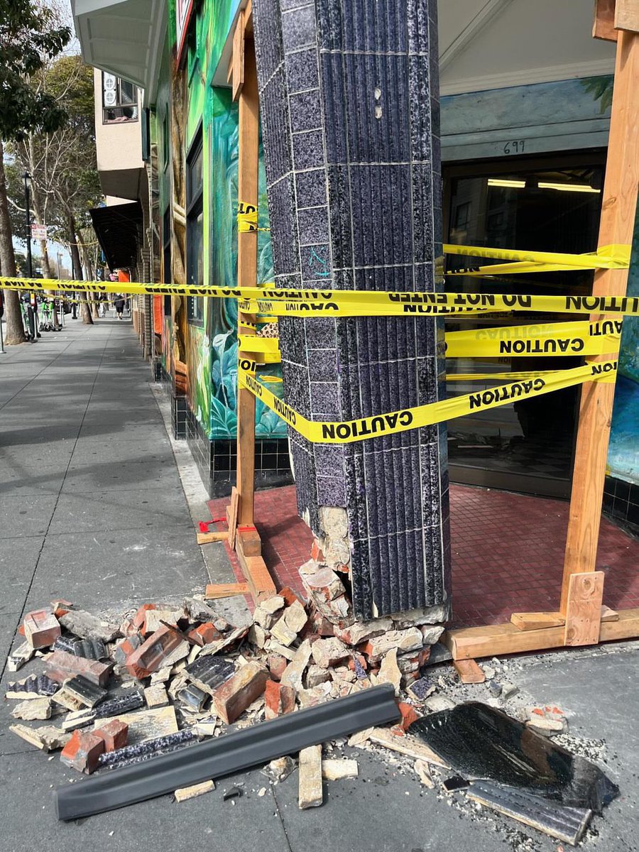 Destructive car crash at Valencia and 18th Streets, damaging long-time merchant, Taqueria El Buen Sabor, and its building 😔😢 SFMTA should install curbside protected bike lanes on Valencia immediately to make safer and better for business and the planet: BetterValencia.com