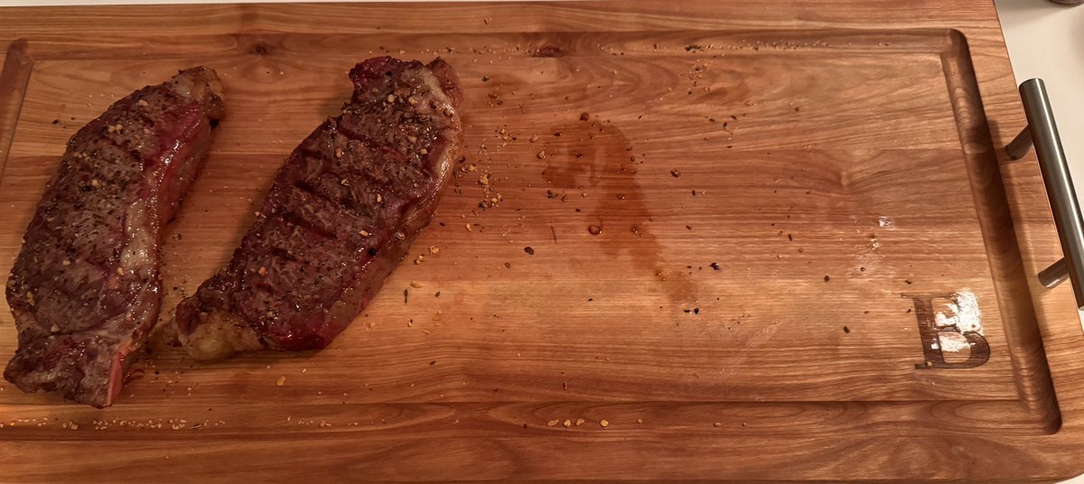 CoachBudke's tweet photo. What a home cooked meal looks like when my wife is gone. Balanced diet…..if I slide one of the steaks to the other end.  #MeatClub @rmann_79 @baker_kansas @EtownCommodore @DrBrittonHart @brethoward33 https://t.co/1h2XsnvRQf