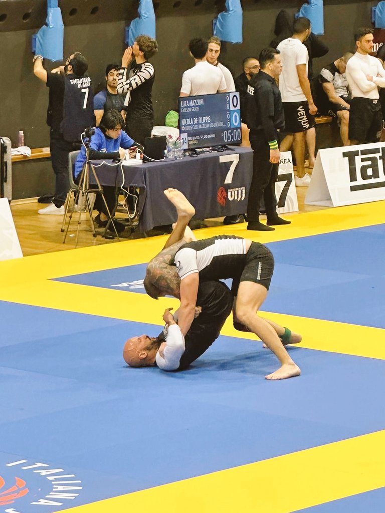 #TriangleSubmission #BJJFight #JiuJitsuLife #MartialArts #SubmissionGame #GroundGame #TriangleChoke #BJJTraining #GrappleLife #CombatSports #FighterSpirit #SubmissionArtist #BJJMoves #TriangleFinish #TrainingHard #MatWarrior #FightGame #BJJTechniques #ChokeHold #BrazilianJiuJitsu