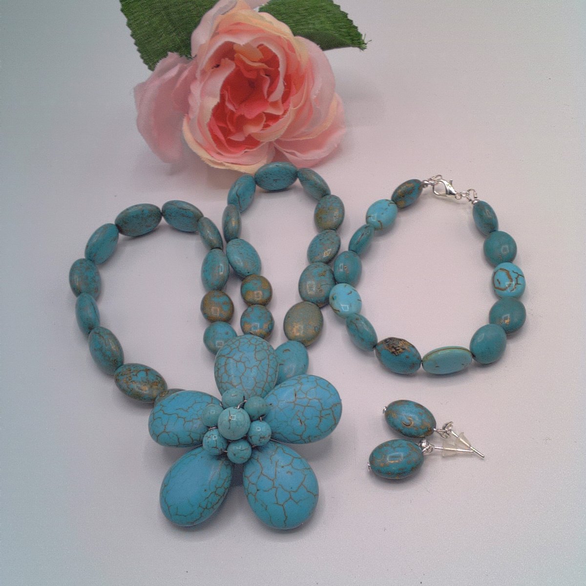 This Turquoise Howlite Necklace, with Beaded Flower, Bracelet & Earrings would go well with your Spring outfits. Lovely Gift Idea £30 + P&P. folksy.com/items/8322523-… #newonfolksy #oswestryjewels #turquoisejewelleryset #giftforher #wirewrappedflower #buylessbuybetterbuyhandmade