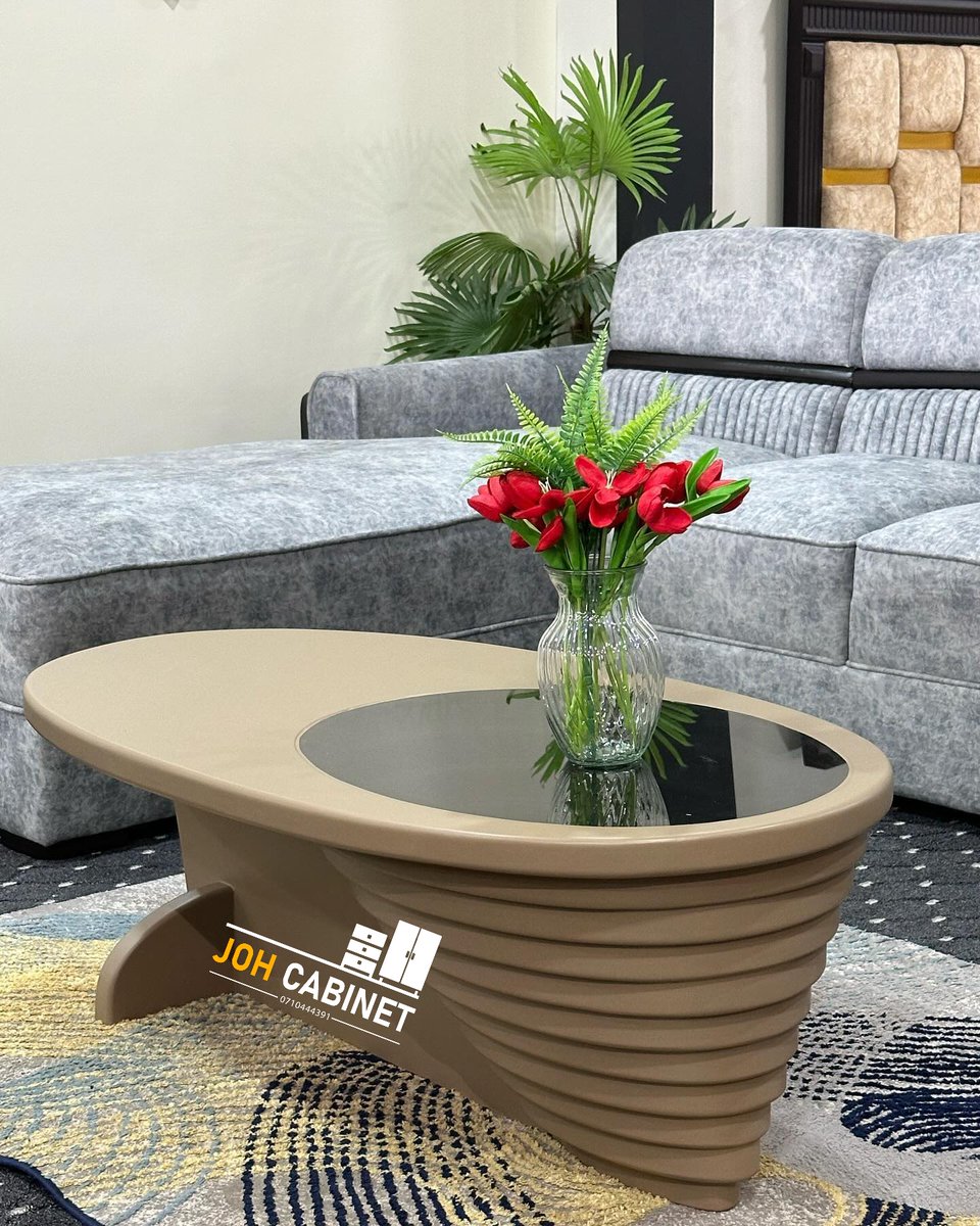 Shipped Coffee table sitting room kwako kuna ubunifu wowote umefanya au ndo bora liende Hii cofee table unaipata kwa Tsh 680,000 Ni custom made order Hio L shape sofa unaipata kwa Tsh 1,200,000 Karibuni sana☎️0710444391 Tufollow @Joh_cabinet kuona sample. 📍 keko furniture