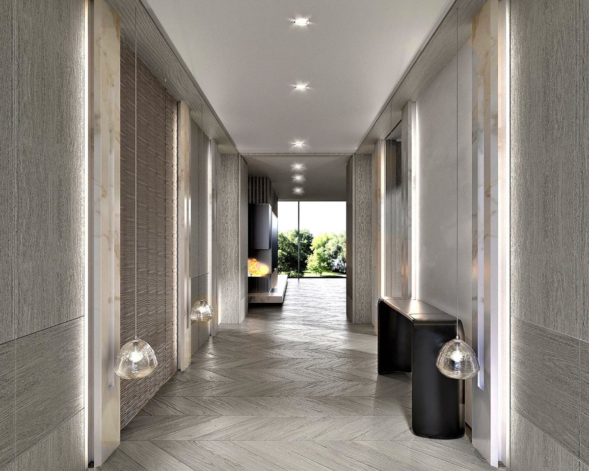 Hallways and lobbies in pale colours are calming, but you also need layers of different textures, using good lighting techniques for depth and ambience. My panelled wall details work well, no matter how you design them. #kellyhoppendesign #beforeandafer #interiordesign