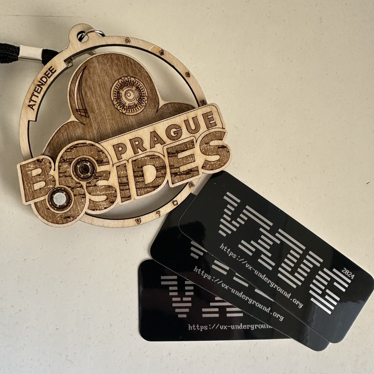 Ahoj #bsidesprg, I brought a couple of new <a href="/vxunderground/">vx-underground</a> stickers, find me in the crowd and have the password ready 😎
