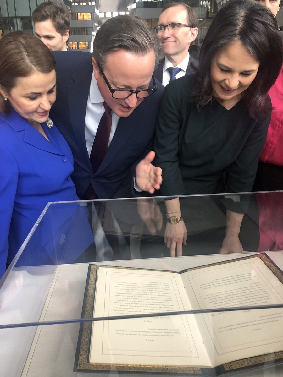 Foreign Secretary @David_Cameron viewing Article 5 in the original Washington Treaty, which is at @NATO HQ for the first time in 75 years for the anniversary celebration.