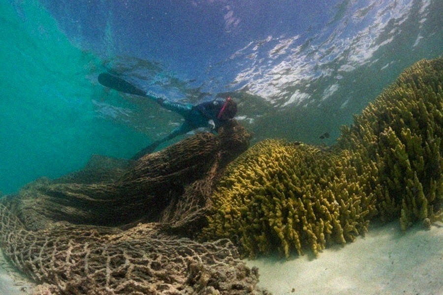 Discarded fishing nets in the ocean collect and drag other plastic trash as they drift. Unfortunately, the Hawaiian Islands act as a strainer in the Pacific, where ghost nets snag coral reefs, and plastic piles up on windward shores. #WetTribe #TidetotheOcean #Hawaii #Ghostnets