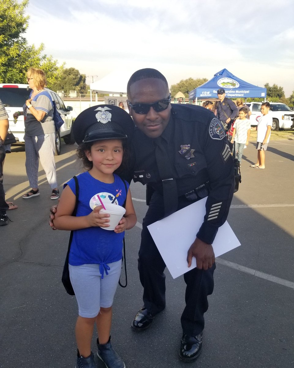 #ThrowbackThursday: This takes me back several years to National Night Out when I paused to inspire this young member of #commUNITY. #RelationalPolicing #LoveWhatWeDo #InspiringThroughTheBadge #MyWhy