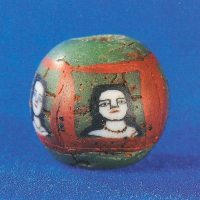 Fascinating world of ancient #glass: a glass mosaic face bead. 1st century AD. Photo: Landesmuseum Württemberg