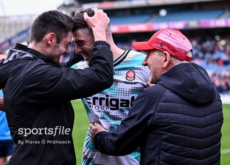 Derry goalkeeper Odhran Lynch, centre, celebrates with team-mate Christopher McKaigue and manager Mickey Harte after their side's victory over Dublin in the penalty shoot-out of the Allianz Football League Division 1 Final last weekend. sportsfile.com/more-images/77…