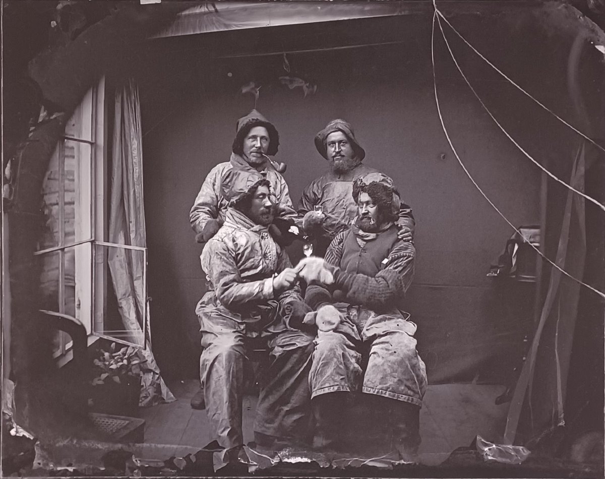 Veðurbitnir sjómenn að fagna vertíðarlok 1872-1888. Weather-beaten fishermen celebrating the end of the fishing season 1872-1888. Photo Nicoline Weywadt.