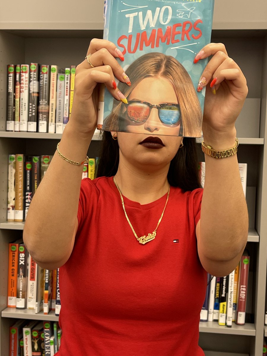 Celebrate #NationalLibraryWeek (April 7 - 13) by making a #Bookface and posting on social media with the hashtag #stluciebookface. Who wore it better: Kasha (purple) or Thalia (red)?