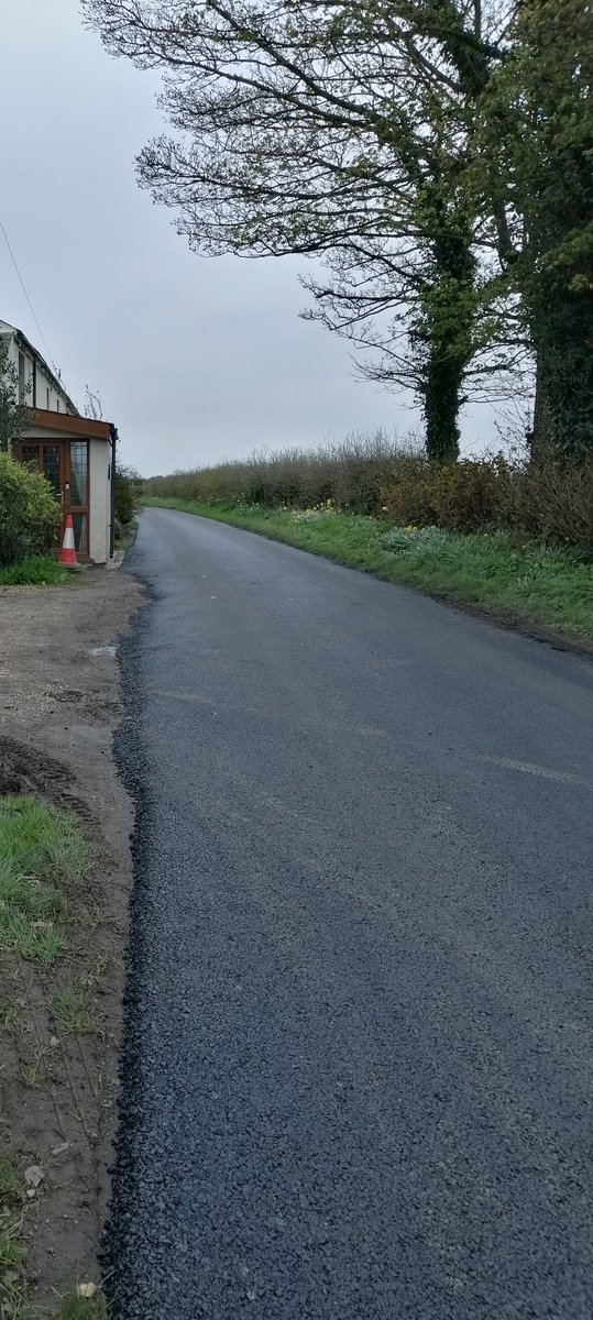 marshgate4's tweet photo. @CumberlandRoads whilst we are delighted to finally get our road improved, do the workers honestly think this is acceptable? This is the entrance to our driveway and it would seem they can't tarmac in a straight line! U2025 Brownrigg to West Border. https://t.co/saPv5fYgSg