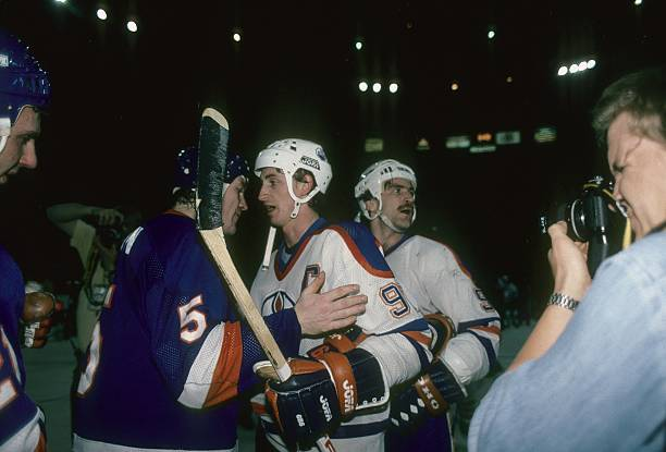 #TheHandshakeLine 1984. The torch is passed from captain to captain as the Isles amazing run comes to an end and the Oilers take over as the NHL's dominant team. Denis Potvin and Wayne Gretzky.