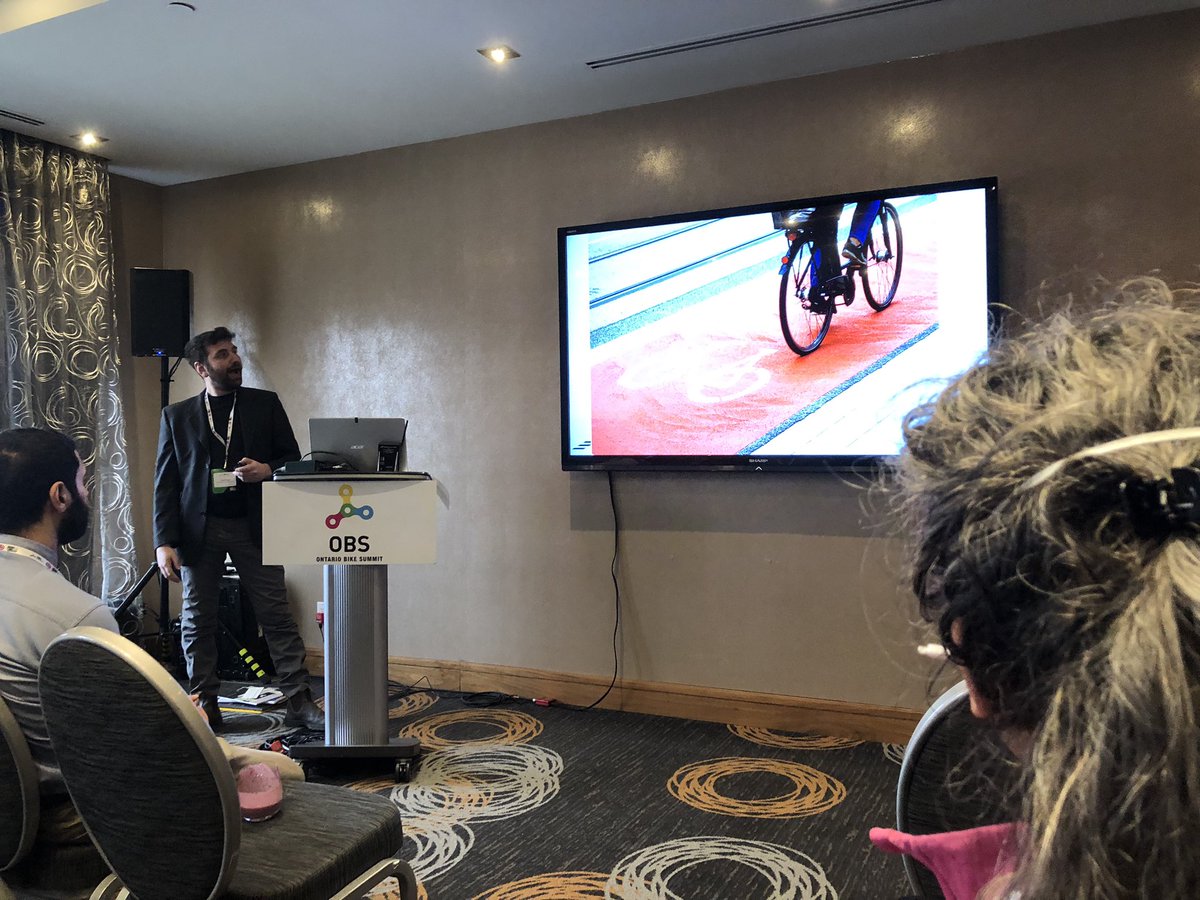 Women are roughly twice as likely to ride along a major roadway if there is a cycle track according to a city-wide poll conducted by @cityoftoronto. Session on equity and accessibility from David Simor of @TCATonline at #obs2024.