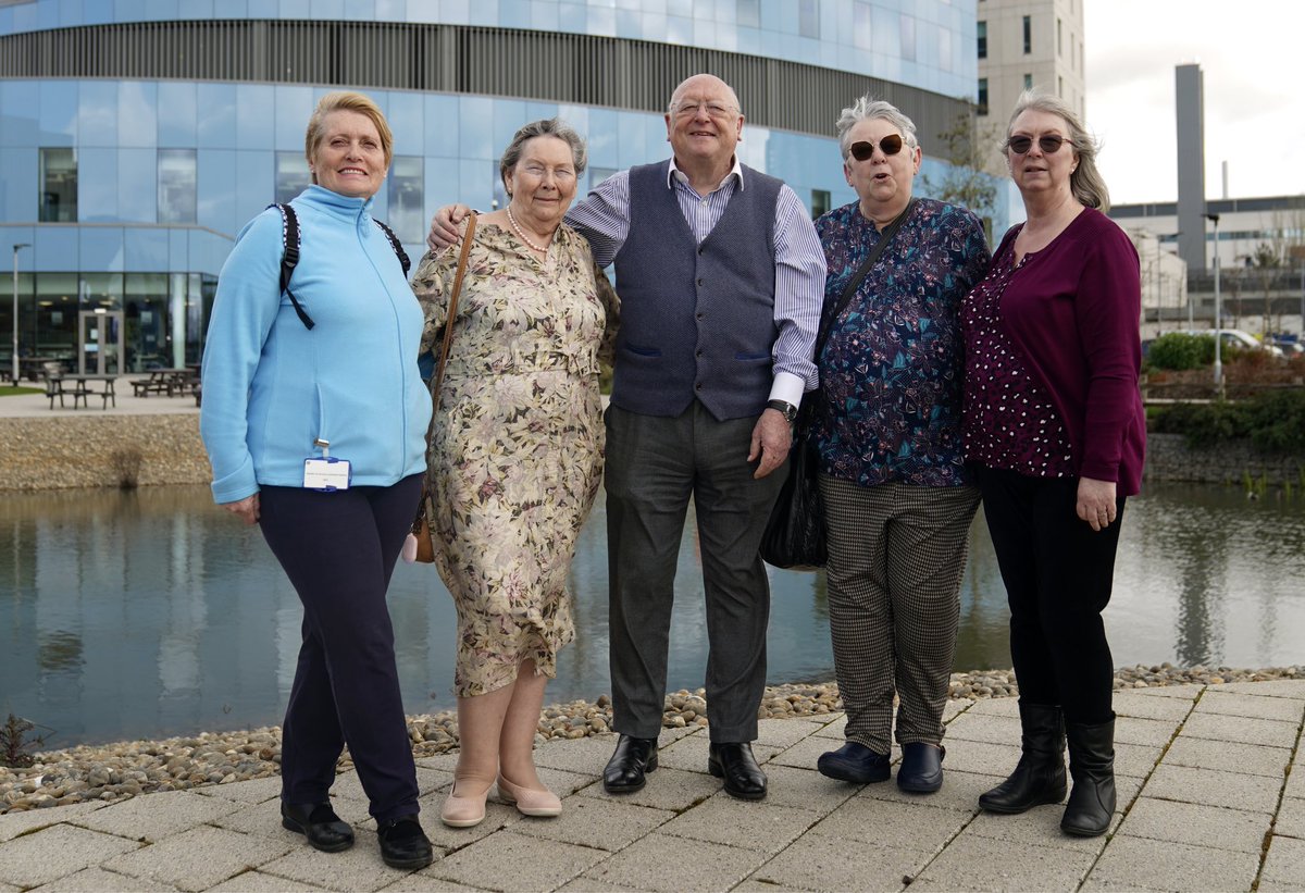 Heart-lung transplant patients Tineke Dixon and Katie Mitchell with their surgeon Professor John Wallwork at the Royal Papworth Hospital as they mark the 40th anniversary of Europe's first successful heart-lung transplant, carried out by a team led by Professor Wallwork