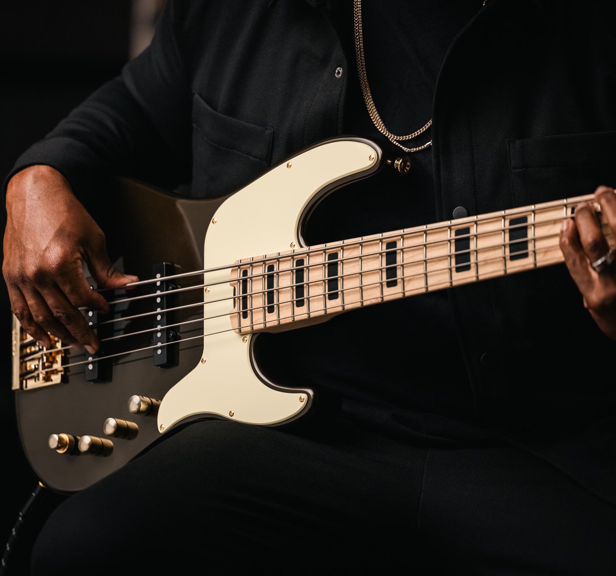 The Adam Blackstone 'Gladys' Jackson Pro Series Signature Concert bass ups the ante in the style realm with all-new vivid black stone finish, creme pickguard, black block inlays and a mixture of black and gold hardware. Check it out: bit.ly/4aj7t5h