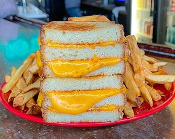 Please welcome back The Classic Triple Decker. 👏 Not one. 🧀 Not two. 🧀🧀 But, three 🧀🧀🧀 slices of perfectly toasted artisan bread and 2x the cheese adorn this perfect grilled cheese sandwich. Order today! ➡️bit.ly/3TfxKMa