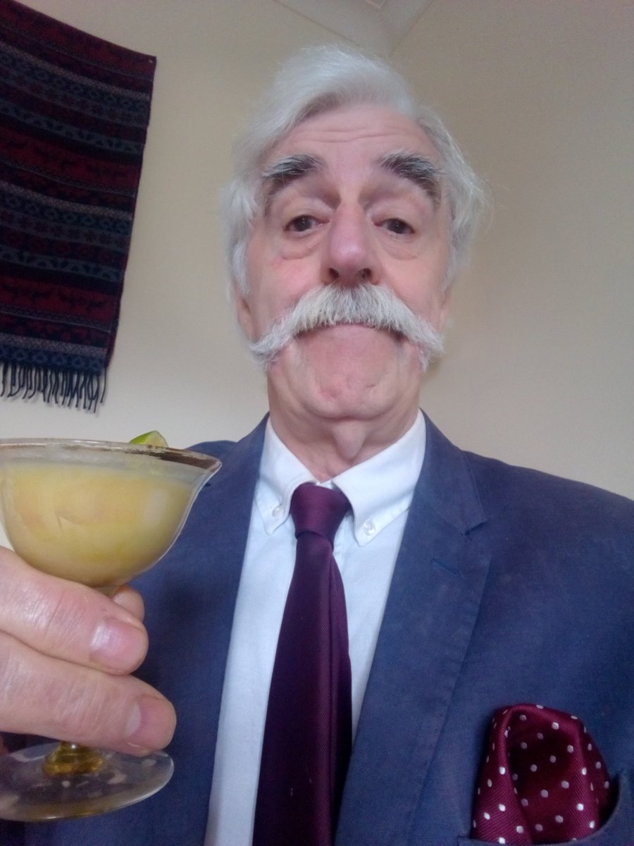 Always important to wear the appropriate clothes and have one's moustache properly waxed before an early evening cocktail.