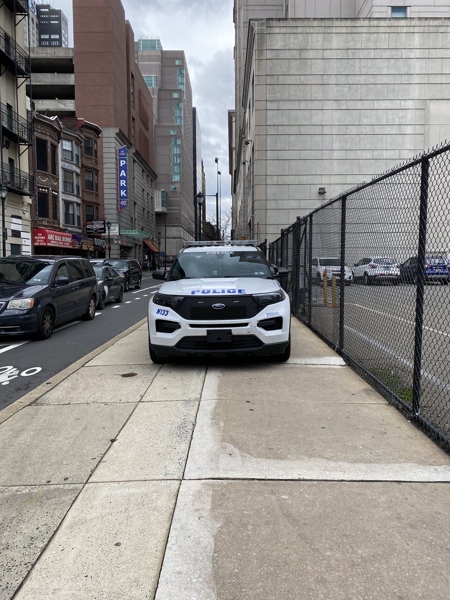 parked on the sidewalk next to a parking lot for them. amazing work on behalf of cops.