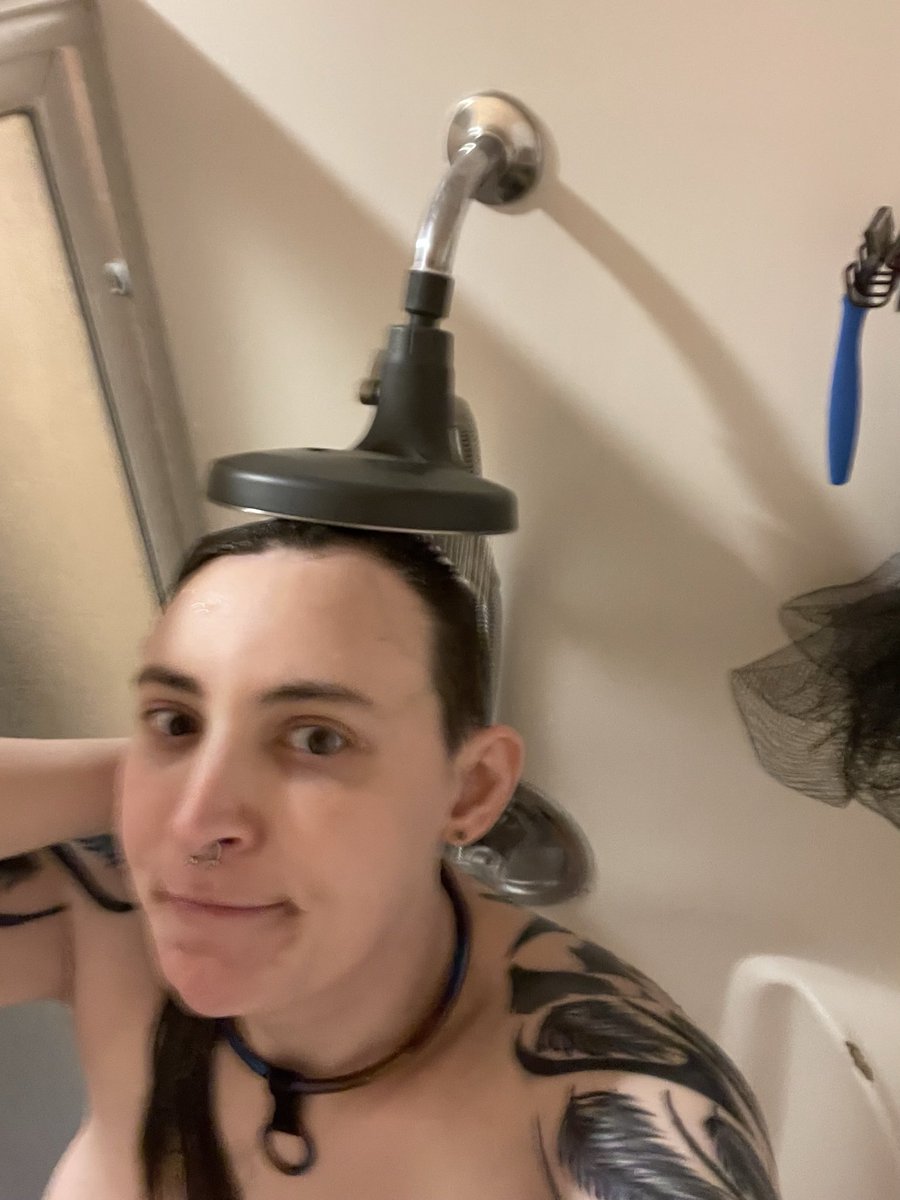 Being sexy in the shower, but also doing a bonk