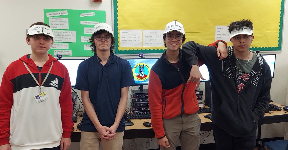 trackir's tweet image. Look at the @ClarkChargers High School (Nevada) Clark Flight Simulator Club sporting our merch and enjoying #HeadTracking camera control!