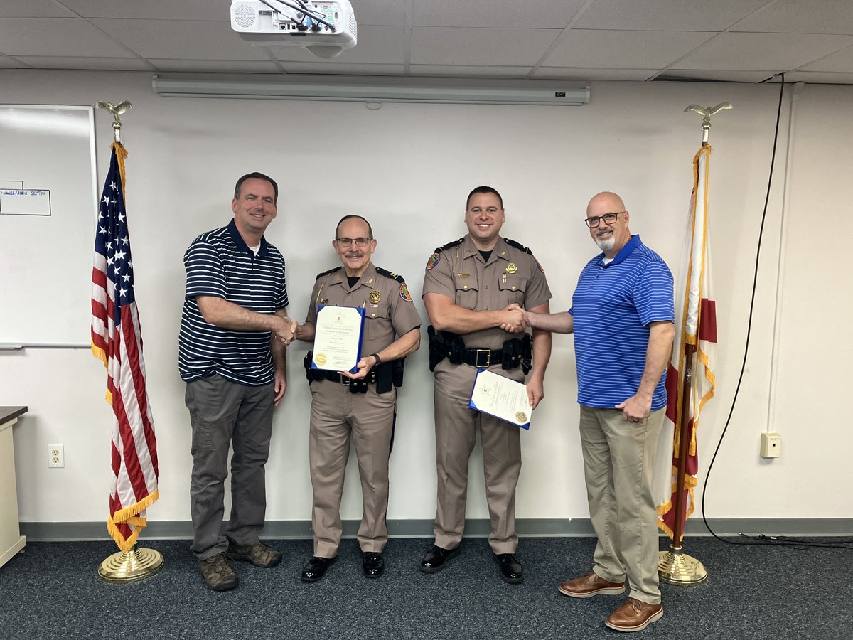 FHPGainesville's tweet photo. Lake City- We recently had a visit from members of the US Secret Service who stopped by to deliver Appreciation Certificates to Captain Mike Burroughs & Lt. Justin Bedenbaugh for FHP assistance with a presidential escort last year. Since 1939..... #CourtesyServiceProtection https://t.co/u49oQX0i3A