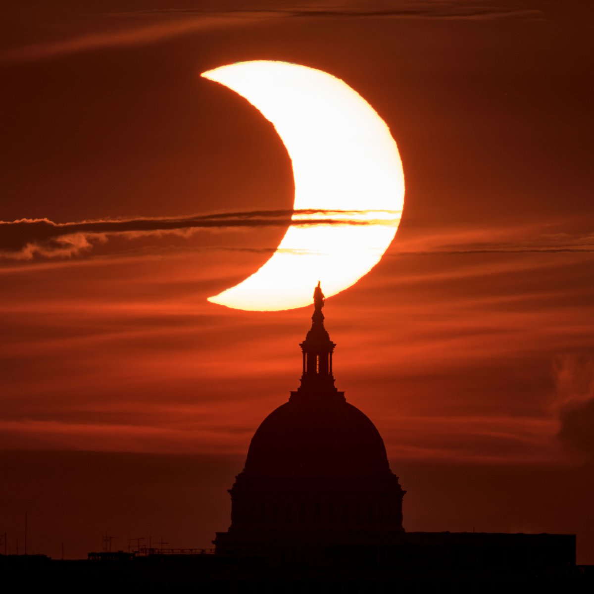 #TBT to the partial #Eclipse over the @USCapitol in 2021! Great pic from @nasahqphoto!