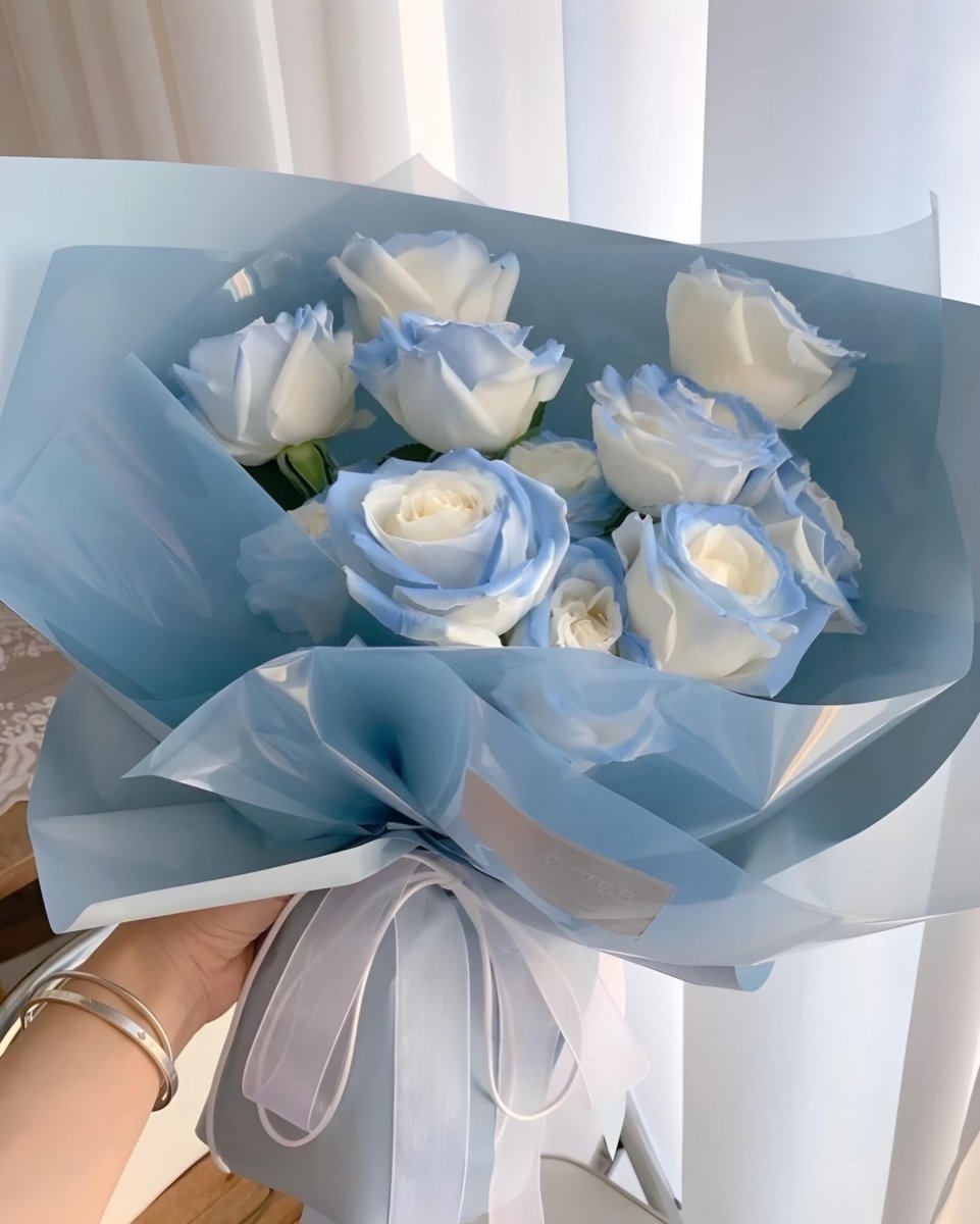 Exulansista's tweet photo. blue roses or blue tulips? https://t.co/nO3dEImlMf