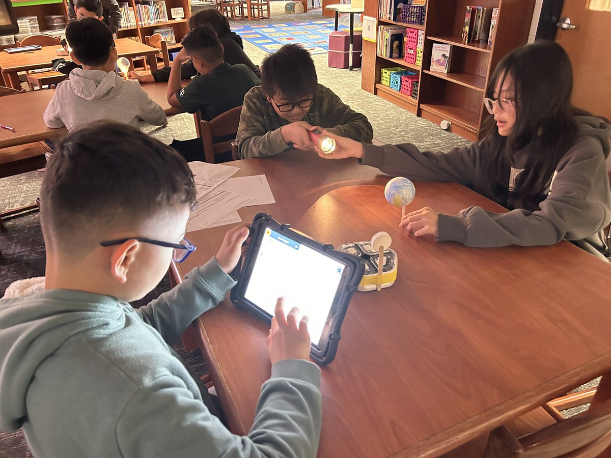 CSLCPS's tweet image. Walked into Forest Grove to see Dawn Johnson having the S’s code the iRobot to simulate the Solar Eclipse! FG’s library is always busy w/ deeper learning activities activating students thinking. S’s were engaged and left with so much knowledge! Hats off 2 Librarians! @csforlcps