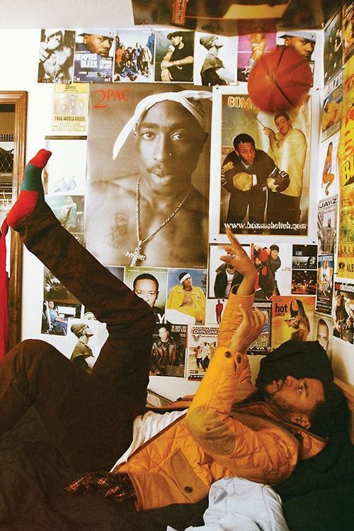 J Cole with Tupac poster in his room.