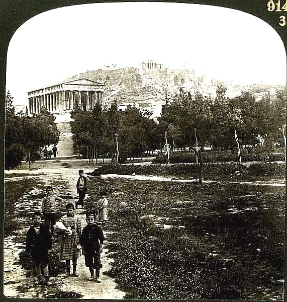 Children before the Temple of Theseus with the Acropolis in the background | Photo 1901 - Mary Evans Picture Library