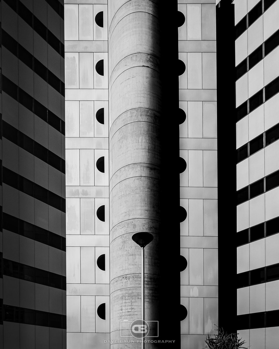 (Swipe for B&W ⏩⏩)
The patterns, lines and curves of the Riverside Centre are simple and cool, don’t ya think? 

Olympus OM-1
M.Zuiko 12-40 2.8 Pro
12 mm | 1/400 sec | F 9.0 | ISO 200 

#Architecture
#Symmetry
#Lines
#Shadows
#Adelaide
#SouthAustralia
#OMSystem
#ItsInOurNATURE