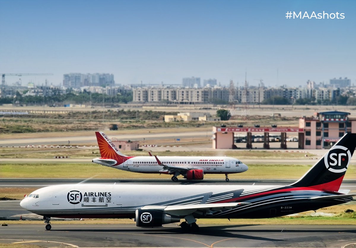 While the SF Airlines wide-body freighter taxis, being ready to take flight into the sky, an Air India @airindia  flight touches down on the runway at Chennai International Airport. #MAAShots #ChennaiAirport 

@MoCA_GoI | @AAI_Official