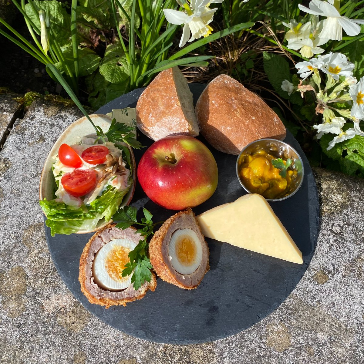 🍽️ Our new dishes celebrate spring flavours & include salmon & asparagus tart with wild garlic mayonnaise slate & Devon pork pie or homemade Moroccan spiced chickpea scotch egg platter served with cheddar, salad, chutney & ciabatta. View menu bit.ly/3PtYvtP #FoodieFriday