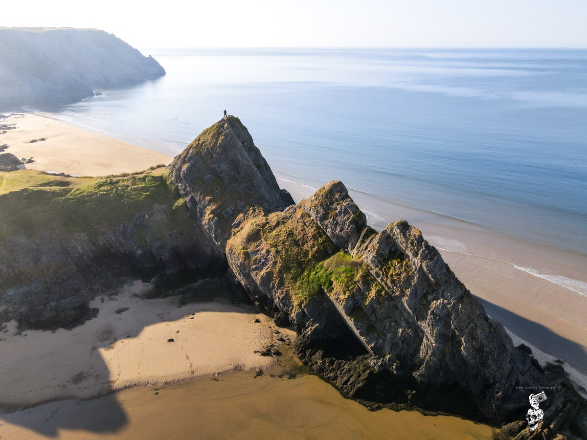 Not many better places to watch the sunrise 🖤 Standing on Three Cliffs #wales #gower