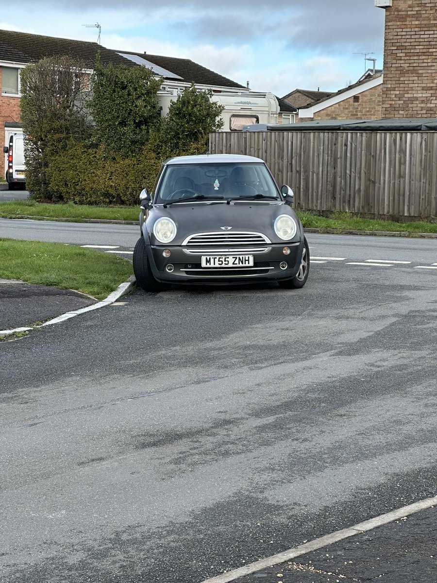 Reg no MT55 ZNH parked in Mills Road Melksham Wiltshire on Thursday March 28 2024 at 8.28am. Parked on the wrong side of the road, and too close to the junction.