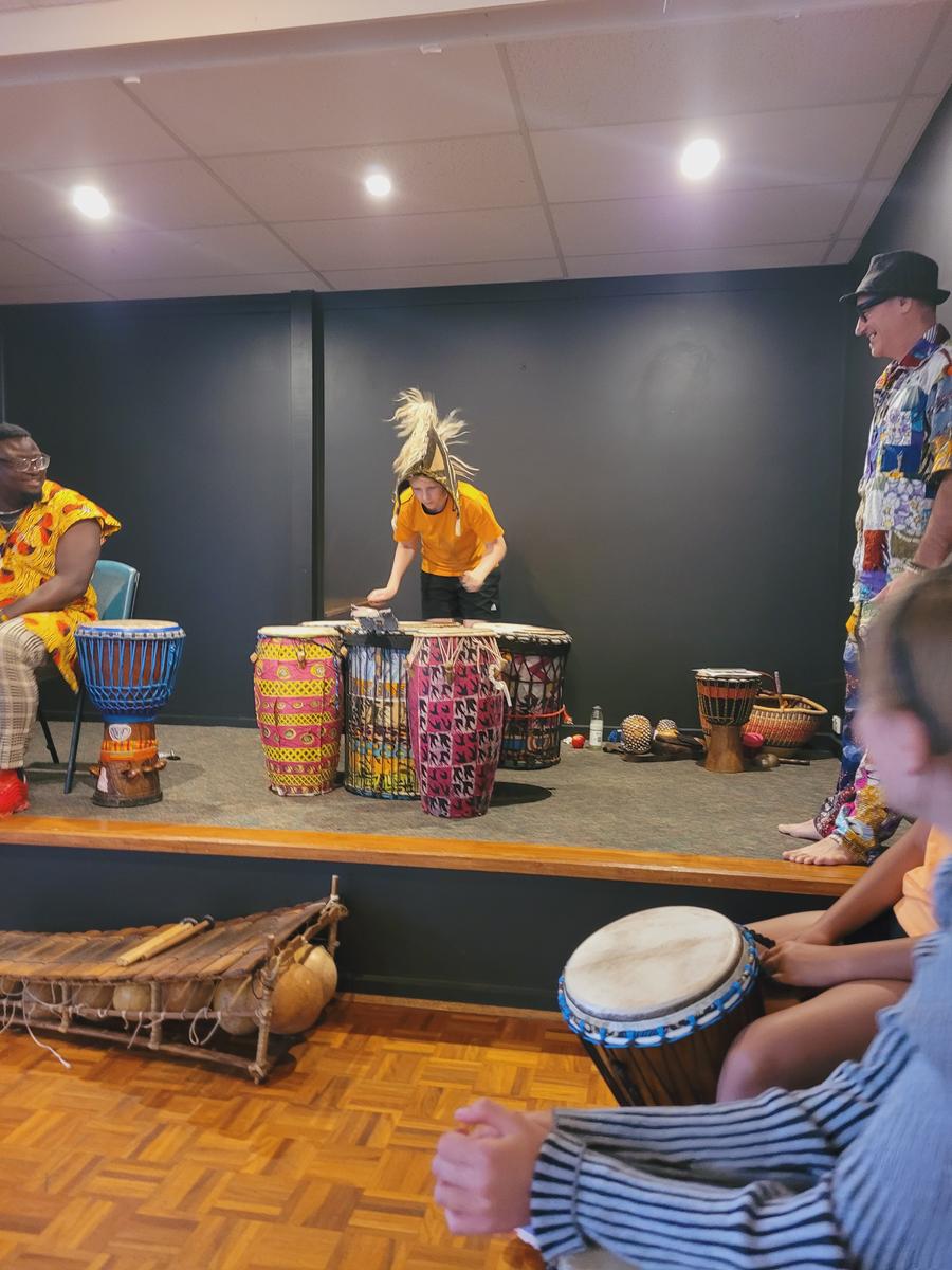 SJPSMitcham's tweet photo. On 25th March  we celebrated Harmony Day at St John's. We learnt about many different countries, cultures, traditions and food. A highlight was experiencing African Drumming with Simon and Fred. We all attended a workshop to learn the drumming and to practice some dancing. https://t.co/skXTDMBtvA