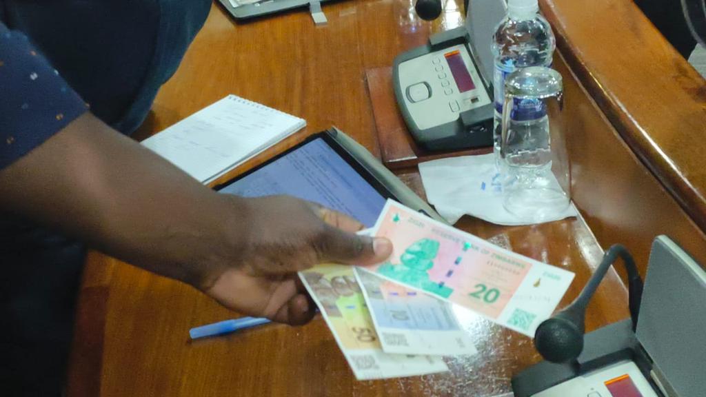 Zimbabwe 's new currency RTGS ARE NOW ZIG. GOLD BACKED DIGITAL TOKENS previously known as Zig is now to be known as DBDG. ALL CASH NOTES TO GO TO BANKS 21 DAY WINDOW PERIOD AND CREDIted #NRTVnews #BeyondYourImagination #zimbabweanstories