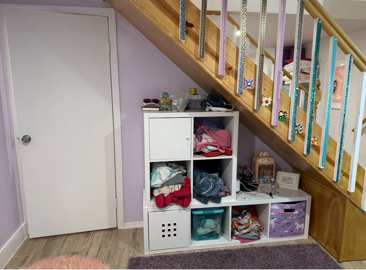 The biggest change to her room is that I had a wall & a door put in. In the 1st photos you can see that Kid #1 only had a baby gate (her space is on the other side of the stairs). She now has a wall & a DOOR. Funny thing is, I kept that gap above the stairway so I can still spy.