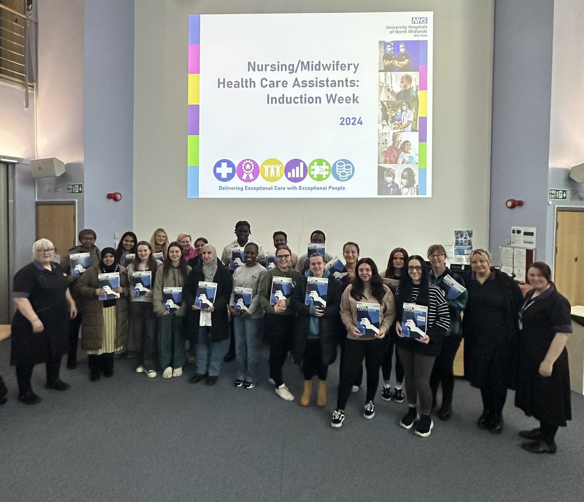 Care Coach Induction week completed! Our April Cohort of Nursing Assistants showing off their new care certificate workbooks, ready to put their theory into practice!