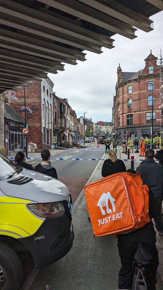 Ignore the fallen down building, but why does the van and Just Eat rider look so Photoshopped in 😂