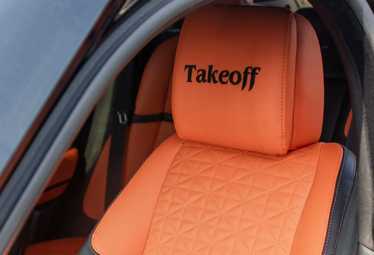 Lovely Orange 🧡 & 🖤 Black Upholstery with a stunning Black - Out Paint Job on this Range Rover Velar #thestunncustexperience #velar #orange