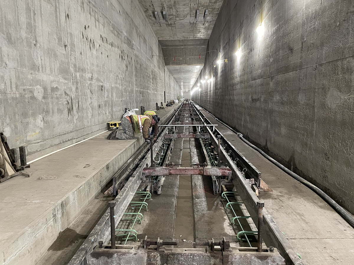 Construction update for April 12: metrocouncil.org/Transportation…

Photo: Construction crew members install concrete plinths in the Kenilworth tunnel in Minneapolis.
