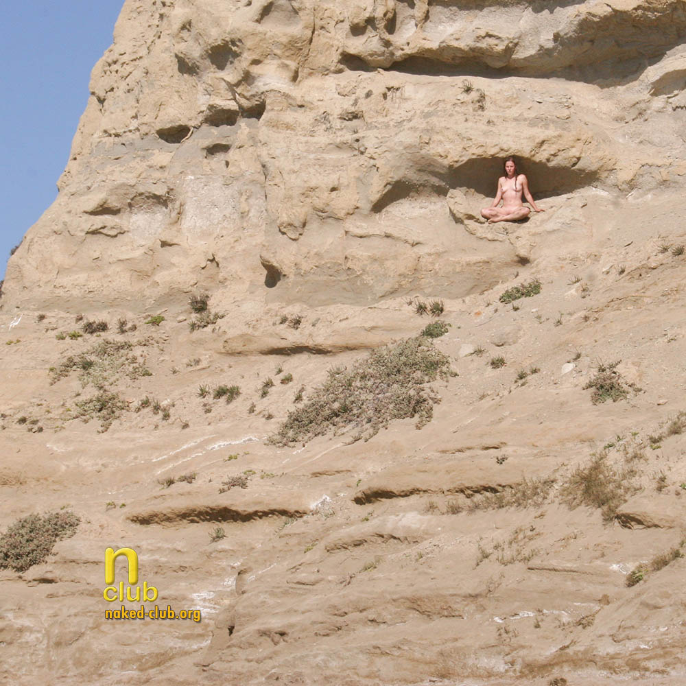 Having become one with nature, she sees all from her place above.     naked-club.org