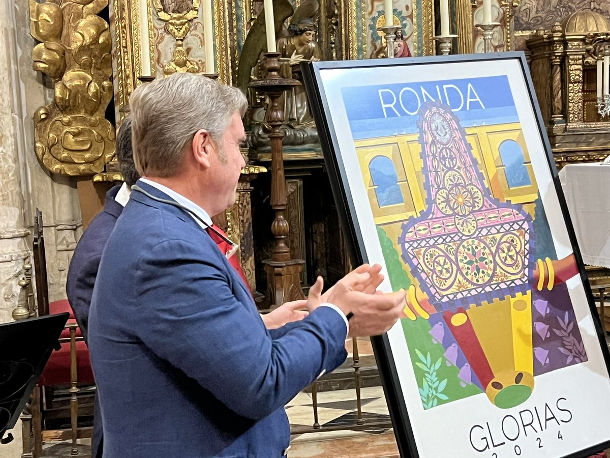 La Hdad. del Rocío protagoniza el cartel de Glorias de #Ronda, obra de los artistas sevillanos Francisco Rovira y David Romero, de Talleres Daroal.
Se trata de una compasión llena de colorido donde destacan los frontiles de los bueyes rocieros y donde el Tajo aparece en 2do plano