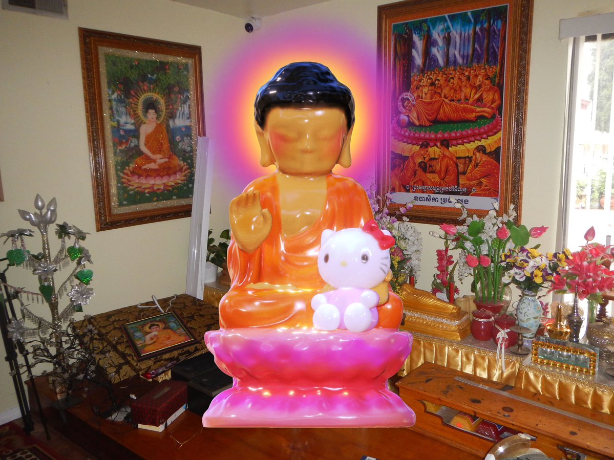 Seated Buddha and Hello Kitty in Wat Khemara Ratanaram, 2024. a sculpture i made for younger me that always brought her toys to temple