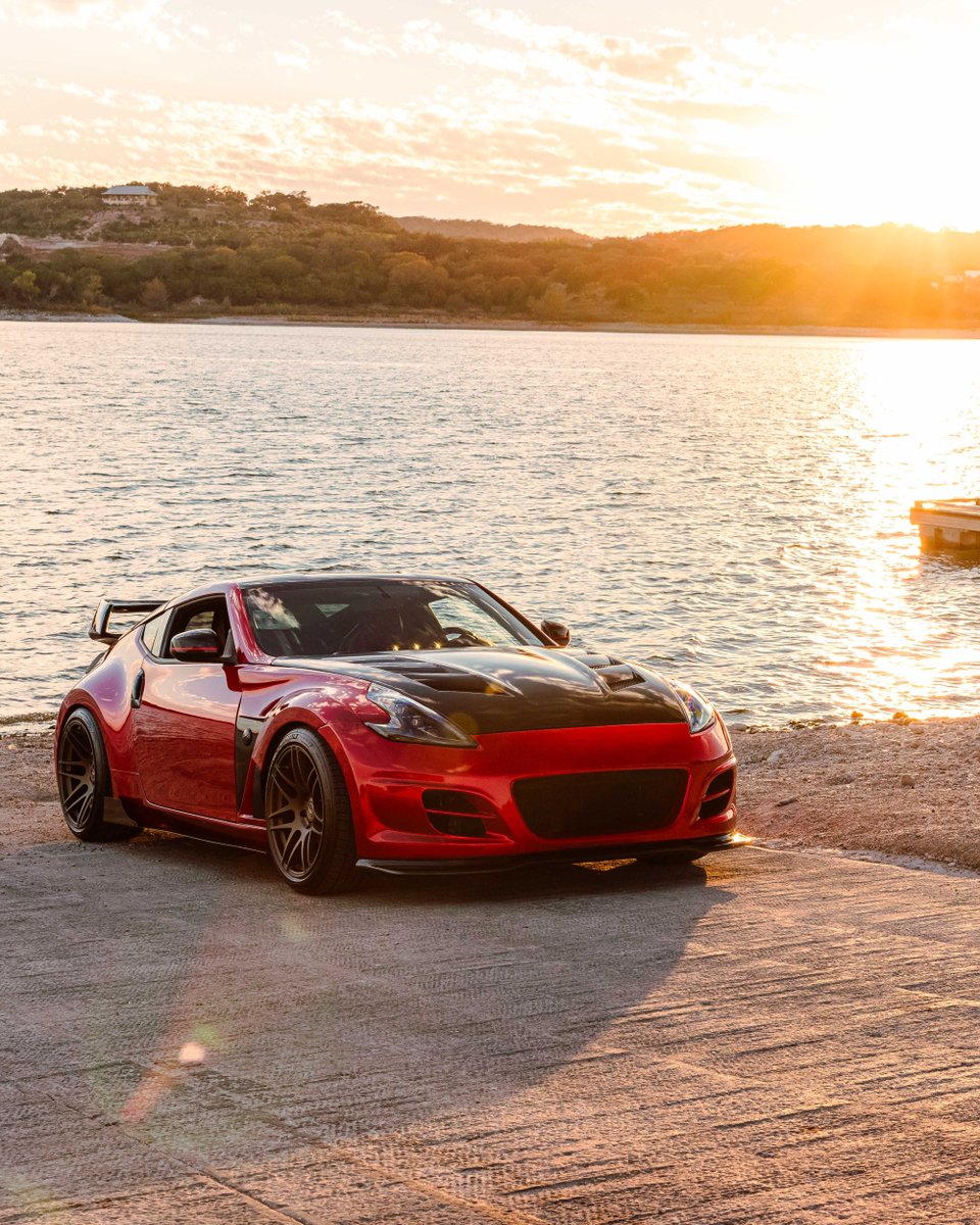 AedanPetty's tweet photo. Golden hour to sunset, by the lake, with this tastefully modded 370Z. Look at that color!

#370Z #nissan370z #nismo #tunercars #jdm #jdmcars #vqfamily #zociety #loweredlifestyle #nissan https://t.co/GrbD2Q4S8g