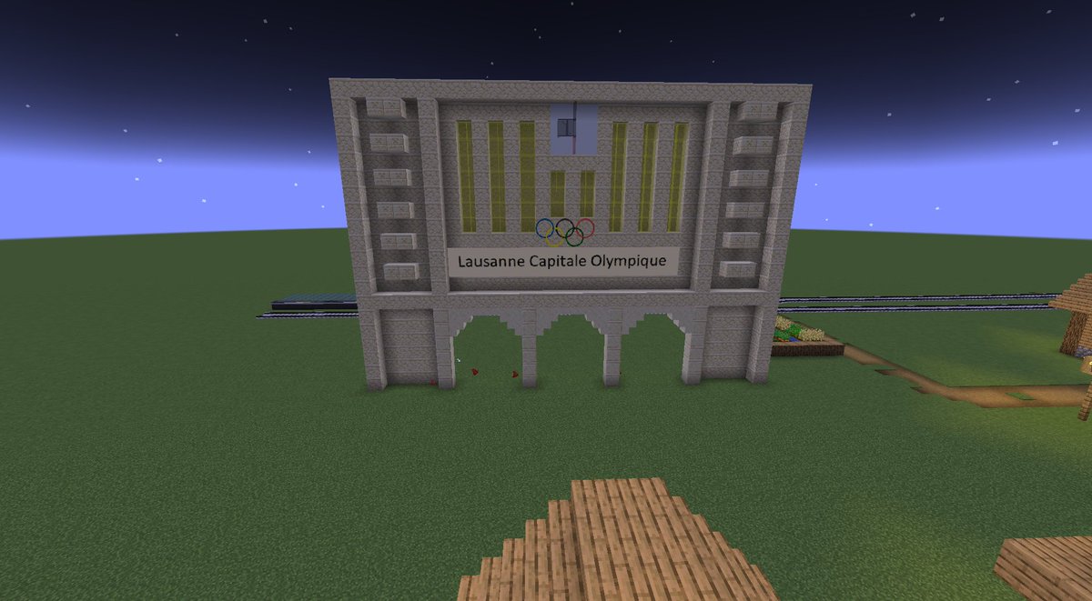 I'm trying to build the facade of the Trainstation of Lausanne in Minecraft (Just this main part.) Here's what I came up with.