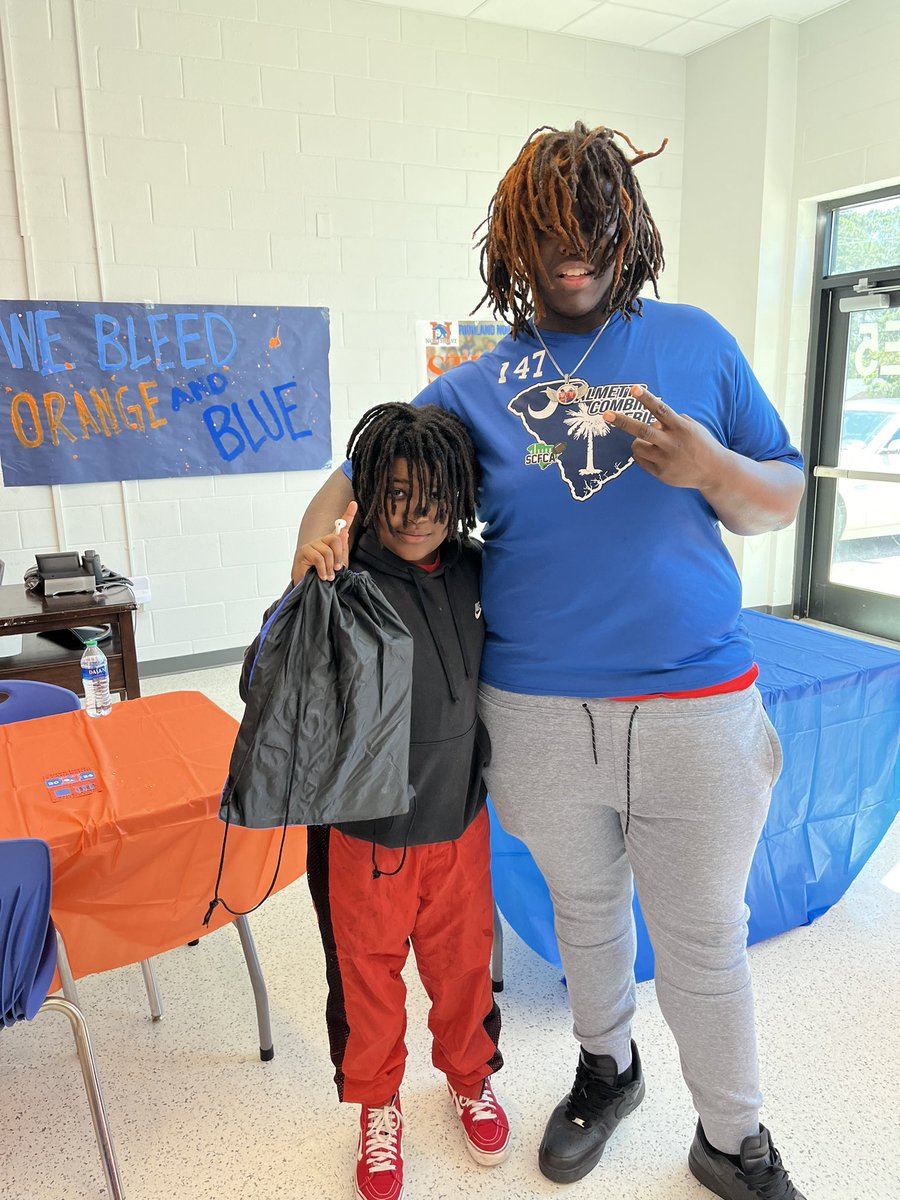 Everyone loves @_bigc0untry_ He stopped by @northeaststugov leadership workshop today by request The @DentMiddle school scholars wanted to take pictures and do Tik Toks with him and he was ALL IN 💙🧡@RNECavaliers @RNEcavsfootball @RNEAthletics