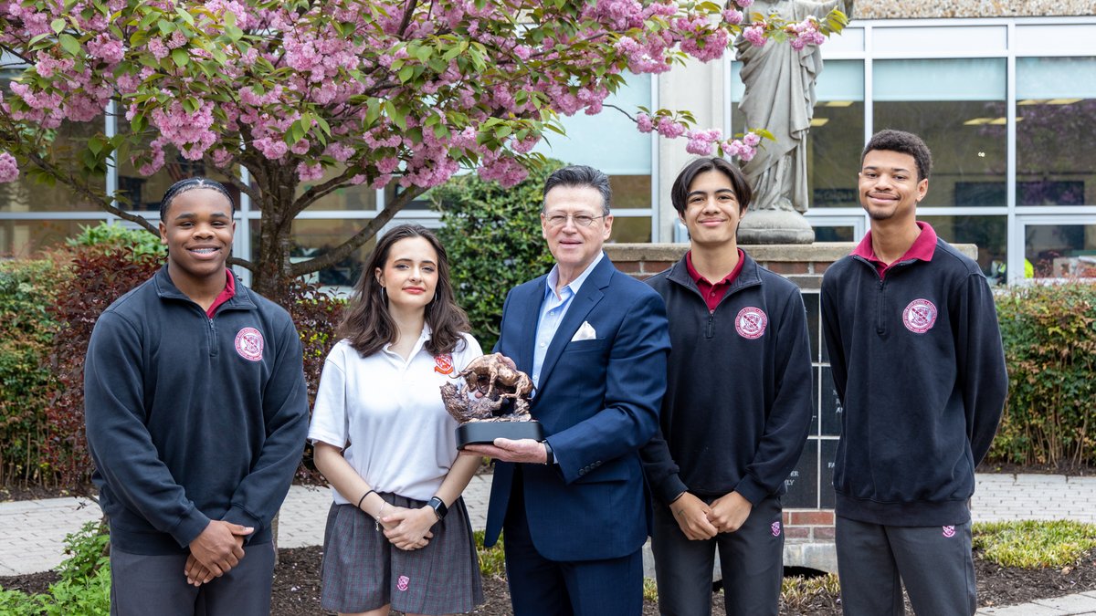 Congratulations to (L-R) Daniel Pressley, Cadence McCarthy, Joseph Myers and Christopher Green pictured here with Dr. Carlo Ninassi (C) being awarded their trophy for their 1st place (!) finish in the 3rd Annual Business Model Design Competition for High School Students!