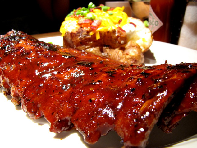 It's a messy job but somebody has to do it so I am it!! BBQ ribs and baked potatoes and a side salad. What's on your menu?